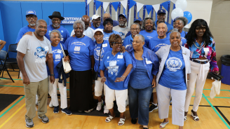 Alumni of Charlotte&#039;s Second Ward High School hold a centennial celebration at the Second Ward Gym.